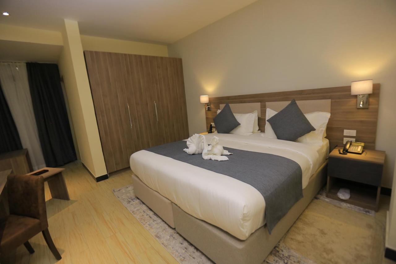 Triple E Hotel And Spa Аддис-Абеба Экстерьер фото